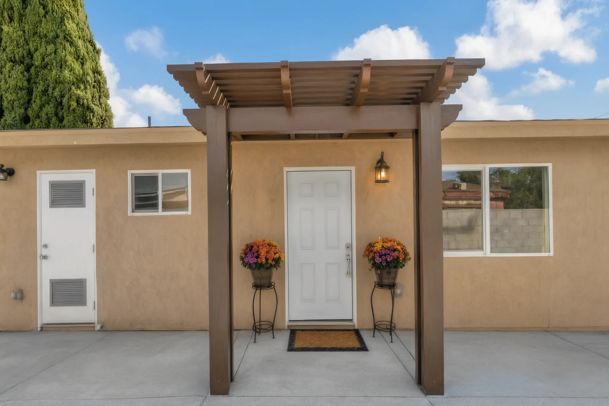 The entry pergola of the finished Santa Ana new construction, built by Avorino